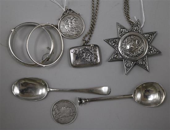 A small collection of silver items,